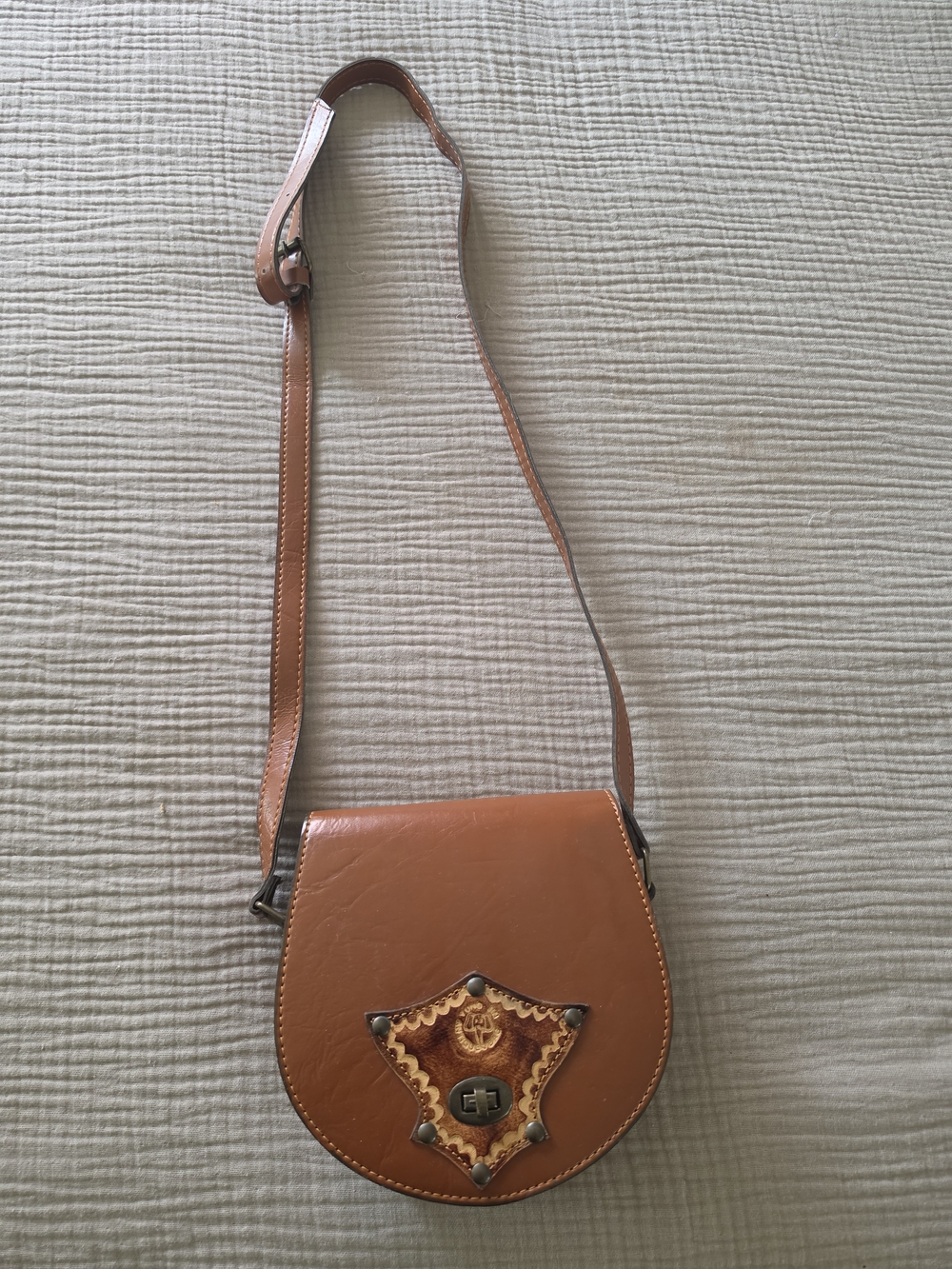 Brown Leather Crossbody Bag with Embossed Accent